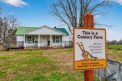 This century farm features a mix of open and wooded acreage with - photo 3