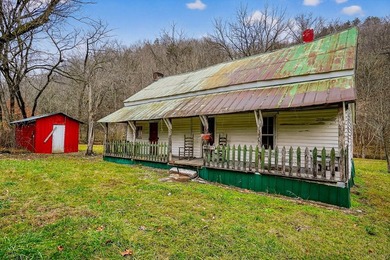 This century farm features a mix of open and wooded acreage with - photo 5