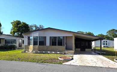 THIS HOME IS ON LEASED LAND WITH A MONTHLY LOT RENT OF $721 AND - photo 1