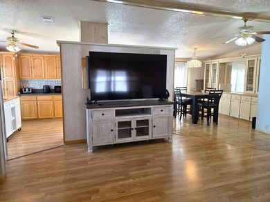 THIS HOME IS ON LEASED LAND WITH A MONTHLY LOT RENT OF $721 AND - photo 8