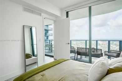 Enjoy stunning city views from this modern 1-bedroom, 1-bath