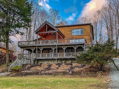 Welcome to 1697 Peninsula Drive, a beautiful log-style lakefront - photo 4