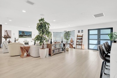 Nestled in the heart of Palm Beach Gardens, this masterfully - photo 2
