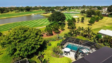 Nestled in the heart of Palm Beach Gardens, this masterfully - photo 3