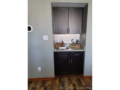 This ground-floor, 1-story, end unit offers plenty of room for - photo 13