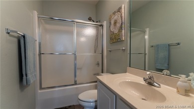 Indulge in refined waterfront living from this elegant 6th-floor