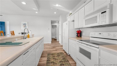 Indulge in refined waterfront living from this elegant 6th-floor