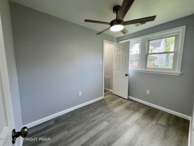 In-town living at its finest! TOTALLY RENOVATED Ranch home on