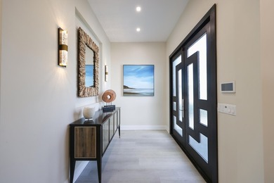 Welcome to the epitome of waterfront living in Ocean Ridge, just - photo 4