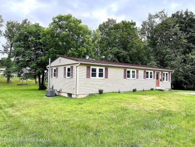 In-town living at its finest! TOTALLY RENOVATED Ranch home on