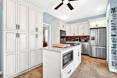 Well maintained and thoughtfully updated, this Morris Park - photo 21