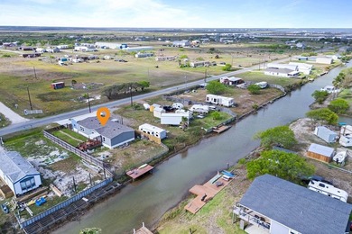 Canal-front turnkey coastal retreat with private fishing dock - photo 24
