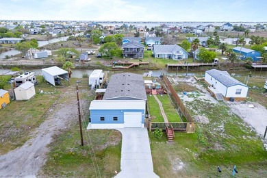 Canal-front turnkey coastal retreat with private fishing dock - photo 25