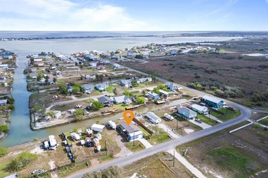 Canal-front turnkey coastal retreat with private fishing dock - photo 27