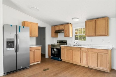 BACK ON THE MARKET AT NO FAULT TO SELLER Spacious double-wide - photo 8