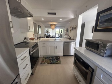 Welcome to this beautifully remodeled and impeccably maintained - photo 2