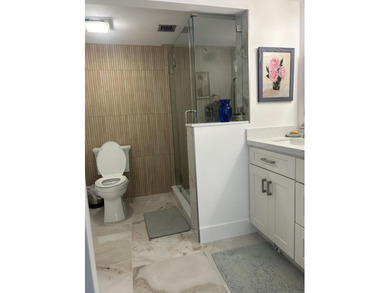 Welcome to this beautifully remodeled and impeccably maintained - photo 10