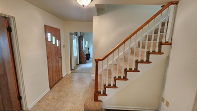 LAKEFRONT in downtown Hobart! This adorable classic brick home - photo 5