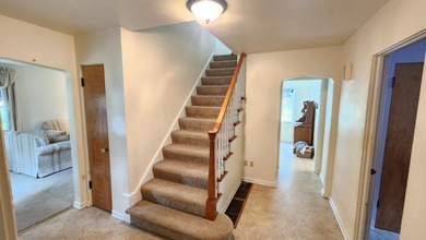 LAKEFRONT in downtown Hobart! This adorable classic brick home - photo 6