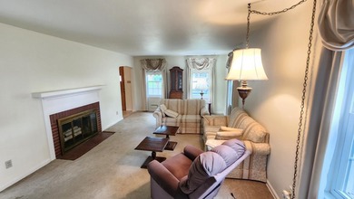 LAKEFRONT in downtown Hobart! This adorable classic brick home - photo 7