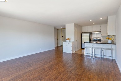 Welcome to this inviting third-floor corner unit featuring 2 - photo 2