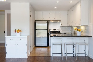 Welcome to this inviting third-floor corner unit featuring 2 - photo 9