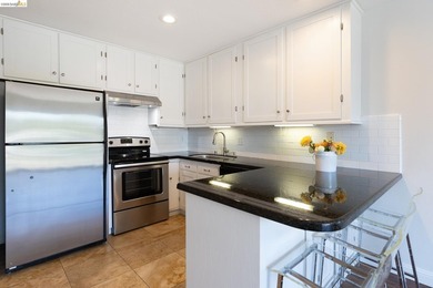 Welcome to this inviting third-floor corner unit featuring 2 - photo 10