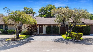 Welcome to this charming two-bedroom, two-bathroom villa in - photo 1