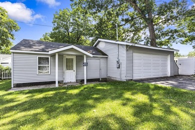 Wake up to beautiful views of Houghton Lake from the spacious - photo 3