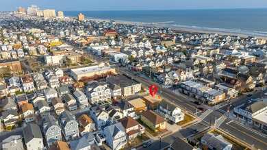 Located just a short walk from the shoreline, this newly