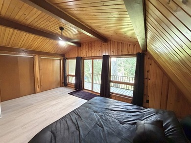 Nestled on a beautifully wooded lot in the gated community of - photo 22