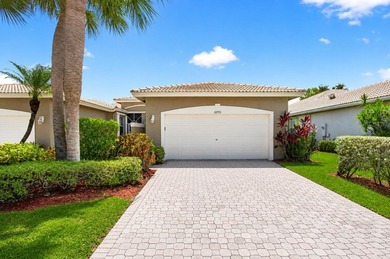Enjoy peaceful lake views from this well-maintained villa in the - photo 1