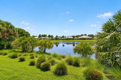Enjoy peaceful lake views from this well-maintained villa in the - photo 2