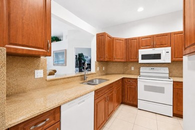 Enjoy peaceful lake views from this well-maintained villa in the - photo 4
