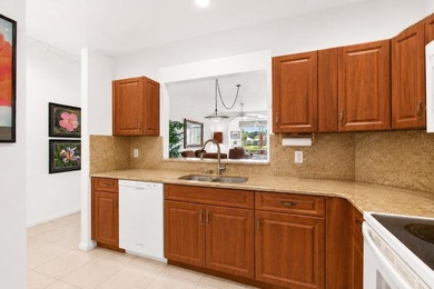 Enjoy peaceful lake views from this well-maintained villa in the - photo 5