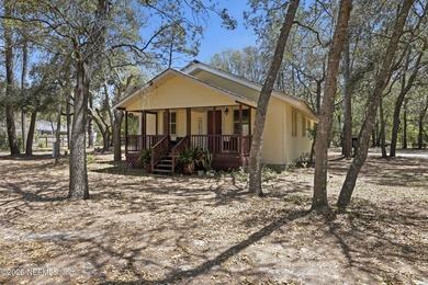 Adorable home with rustic farmhouse flair nestled on just over - photo 2