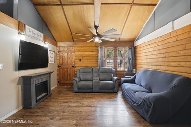 Adorable home with rustic farmhouse flair nestled on just over - photo 6