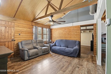 Adorable home with rustic farmhouse flair nestled on just over - photo 9