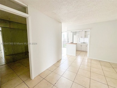 Great 2/2 , plus a Den, half a block from the beach on the - photo 8