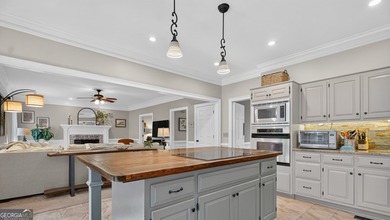 Welcome home to this masterfully designed and meticulously - photo 17
