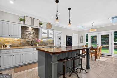 Welcome home to this masterfully designed and meticulously - photo 21