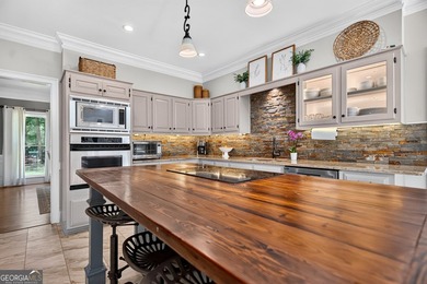 Welcome home to this masterfully designed and meticulously - photo 22