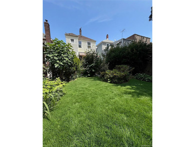 Exceptional opportunity to own a detached two-family home in a - photo 27