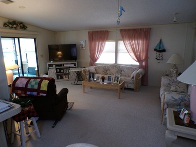 Well-maintained 1990 manufactured home located on a desirable - photo 6