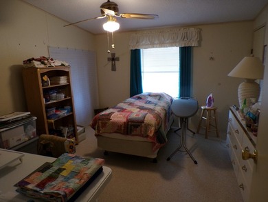 Well-maintained 1990 manufactured home located on a desirable - photo 8
