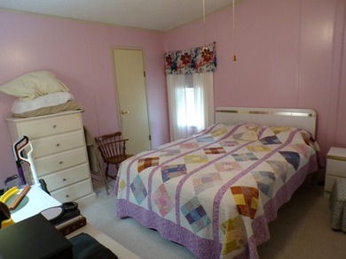 Well-maintained 1990 manufactured home located on a desirable - photo 9