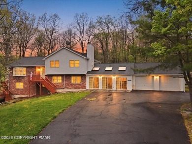 Tucked away in the heart of the Poconos, this expansive - photo 1