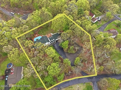 Tucked away in the heart of the Poconos, this expansive - photo 6