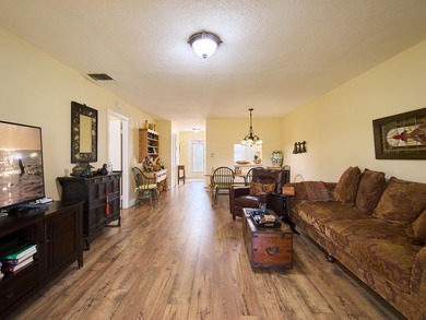 Welcome to this charming 2-bedroom, 2-bathroom villa nestled in - photo 4