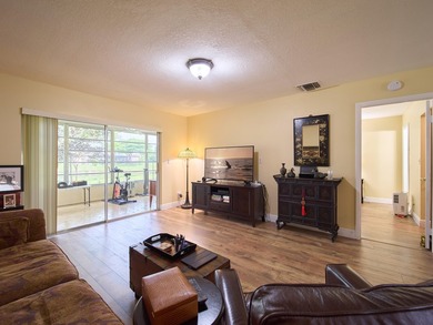 Welcome to this charming 2-bedroom, 2-bathroom villa nestled in - photo 5
